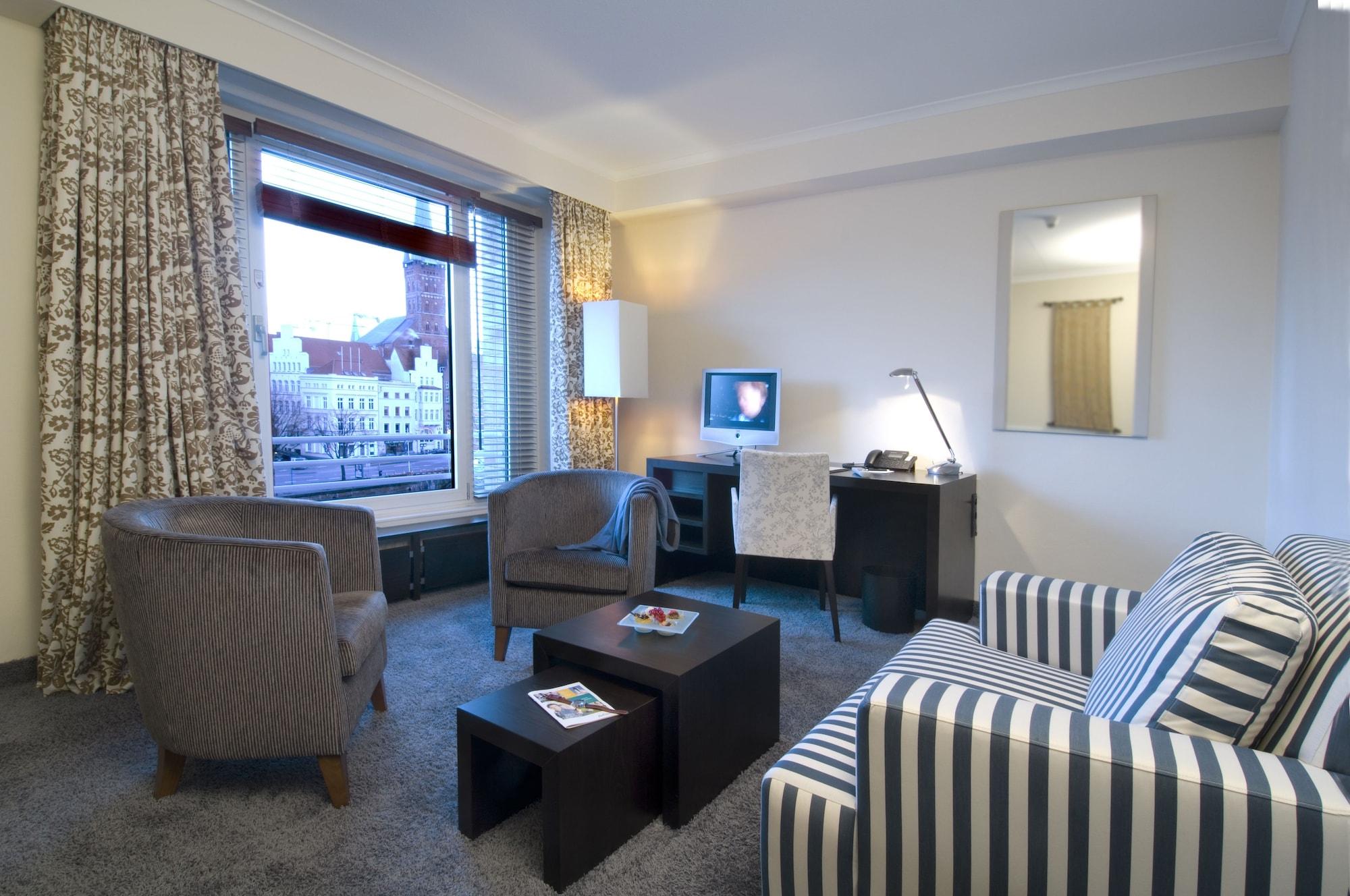 Radisson Blu Senator Hotel, Luebeck Exterior photo A living room in a serviced apartment in Hamburg, Germany